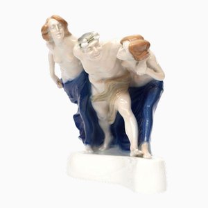 Figura in porcellana Fauno con ninfe