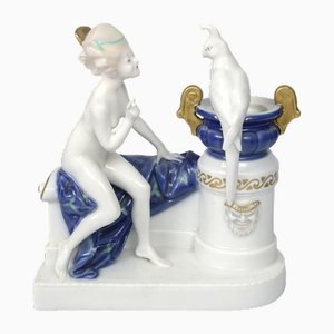 Figura in porcellana di ragazza nuda con pappagallo