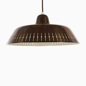 Pendente in ottone con motivo traforato nello stile di Paavo Tynell, anni '50