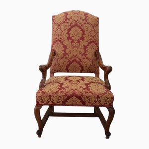 18th Century Armchair in Carved Walnut