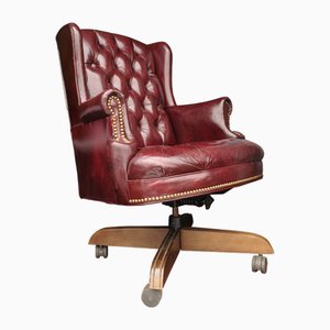 20th Century Button Back Chesterfield Revolving Desk Chair with Polished Burgundy Red Leather Upholstery with Tilt Action, 1970s