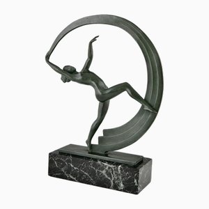 Janle para Max Le Verrier, Bacchanale Art Déco desnuda con bufanda, 1930, metal sobre base de mármol