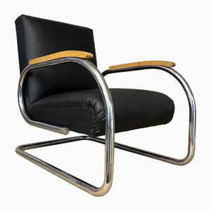 Tubax Armchair in Black Faux Leather
