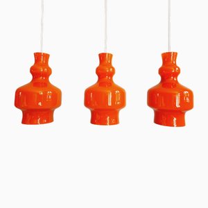 Lampada a sospensione in vetro opalino arancione di Raak Amsterdam, anni '60