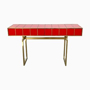 Consola de vidrio rojo con dos cajones