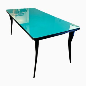 Mesa de madera lacada en negro con superficie de vidrio lacado en verde, años 60