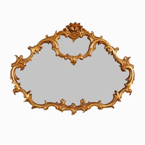 Specchio con cornice intagliata e dorata