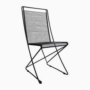 Silla Cross Swing posmoderna en negro de Till Behrens para Schlubach, años 80