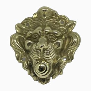 Campana a forma di leone d'oro