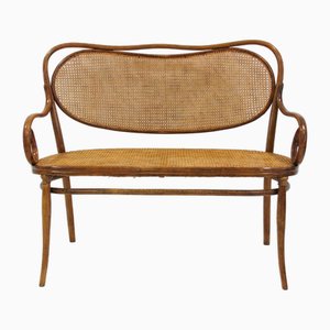 Divano secessionista viennese in legno curvato e vimini di Thonet