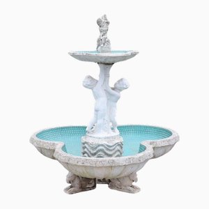 Fuente de jardín neoclásica con estatua, de principios del siglo XX