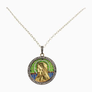 An Gold Pendant on a Chain with Our Lady on Stained Glass Enamel, in an Antique Case.
