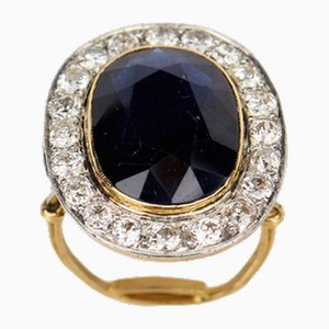 Gold, Platinum Ring with Sapphire and Diamonds.