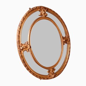 Specchio vittoriano ovale in legno dorato