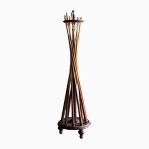 Soporte giratorio para taco de billar