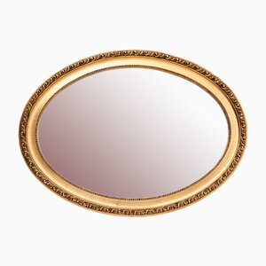 First Half of the 20th Century Oval Mirror in a Gold Frame, France, 1920s