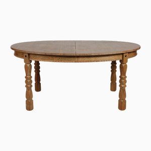 Danish Oval Oak Extendable Dining Table by Henning Kjærnulf, 1970s