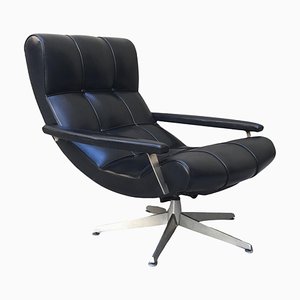 Sillón giratorio y ajustable de vinilo, años 70