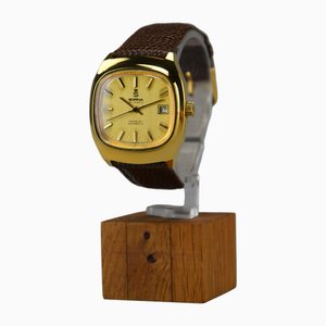 Reloj de pulsera automático Nos suizo bañado en oro de Sorna, años 70