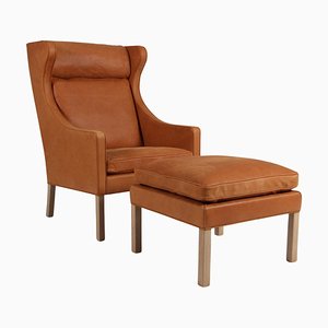 Poltrona Wingback con poggiapiedi in pelle Dunes Sørensen attribuita a Børge Mogensen per Fredericia
