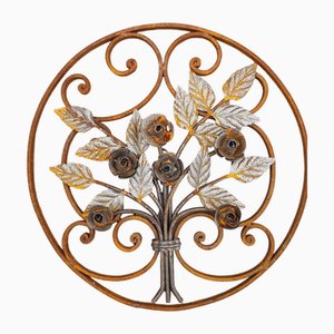 Elemento decorativo Art Nouveau rotondo in ferro battuto con rose e fiori