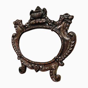 Espejo de pared italiano ovalado de cobre plateado, década de 1890