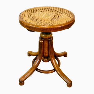 Sgabello vintage girevole in legno curvato e canna di Thonet, anni '20