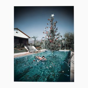 Slim Aarons, Christmas Swim, Estate timbrato C-type Digital Print