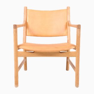 Lounge Chair in Oak and Patinated Leather by Hans Wegner for Carl Hansen & Søn, 1960s