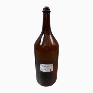 Botella grande de vidrio ámbar