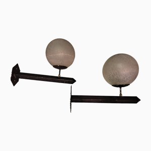 Lámparas de pared de hierro lacado en negro y latón con esfera grabada, años 60. Juego de 2