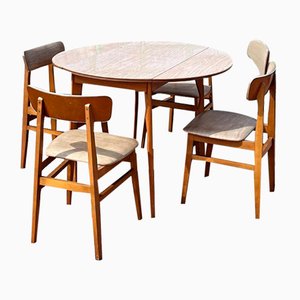 Mesa de comedor extensible y sillas Mid-Century. Juego de 5