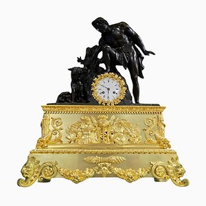 Orologio impero modello grande raffigurante Faustolo alla scoperta di Romolo e Remo, 1825