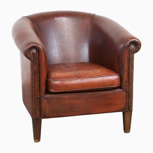 Club chair in pelle di pecora