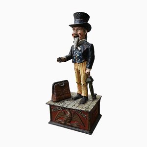Alcancía mecánica Uncle Sam de hierro fundido, siglo XIX