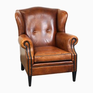 Poltrona Wingback in pelle di pecora