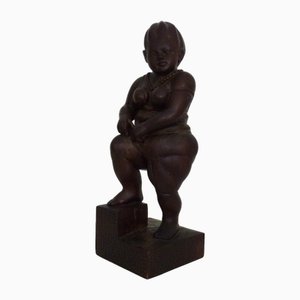 Grotesque Exotic Wood Sculpture of a Woman Showing Her Thigh in the style of Botero, 1980s