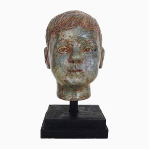 Scultura di Volto di bambino in arenaria smaltata, Italia, anni '70