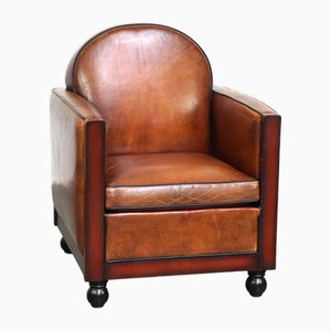 Poltrona Art Deco in legno e pelle color cognac
