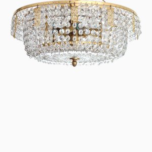 Lampadario in cristallo e ottone