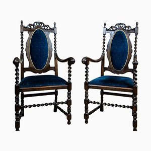 Poltrone eclettiche antiche intagliate, fine XIX secolo