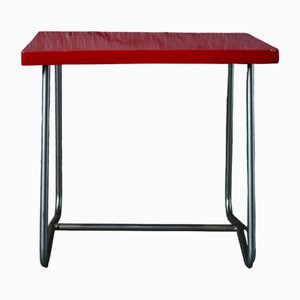 Scrivania modernista rossa in legno e tubo di alluminio di R. Gleizes, anni '50