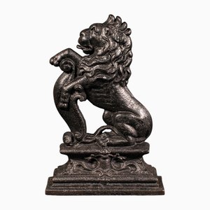 Tope de puerta inglés de hierro fundido con forma de león