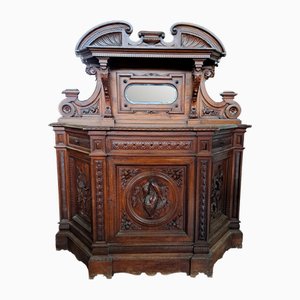 Credenza in legno di noce intagliato, Italia