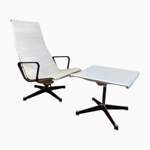 Aluminum Lounge chair EA124 and EA125 Ottoman from Herman Miller