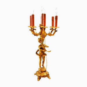 Lámpara Putto de bronce con seis luces