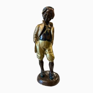 Figura in ottone di un giovane ragazzo con cappello, inizio XX secolo