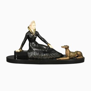 Escultura francesa Art Déco de metal y mármol de Salvatore Melani, años 20