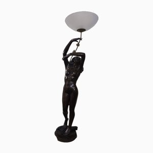 Lámpara con figura de mujer de bronce fundido de Rugiano, 1996