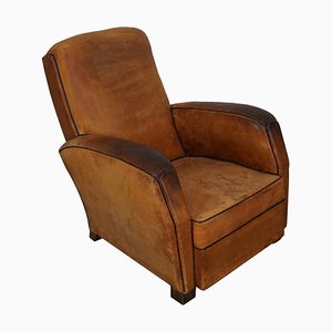 Club chair vintage in pelle color cognac, Francia, anni '50